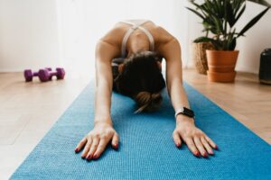 woman stretching in a mat